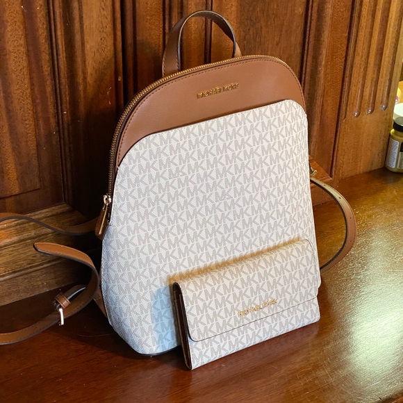 Michael Kors Handbags - NWT Michael Kors LG Emmy backpack&wallet vanilla